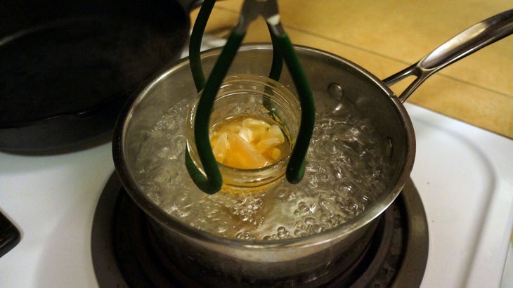 Make a Firestarter-Step 7 Bring a pot of water to boil (make sure the water level is an inch or so below the top of your jar). Using tongs, hold the jar steady in the boiling…