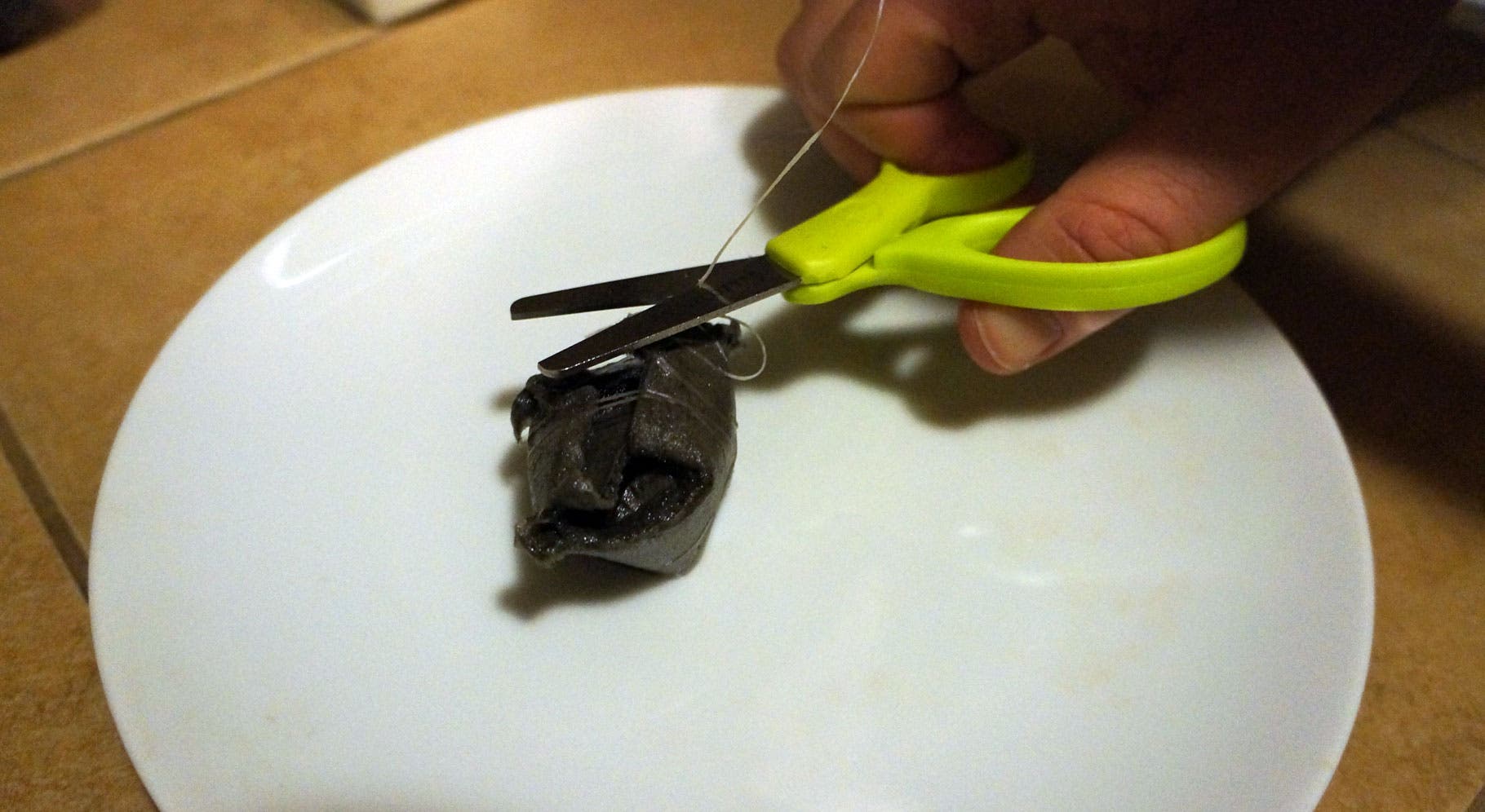 Make a Firestarter-Step 9 Place on a clean drying surface and cut floss with scissors.