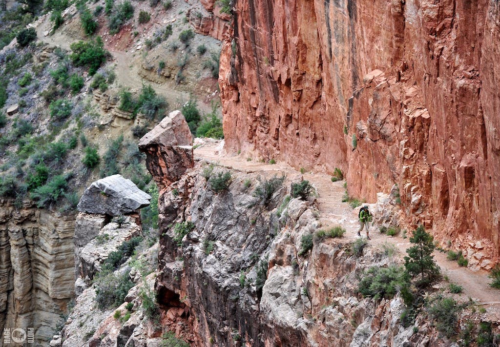 Hikers watch ecology morph between riparian and desert vegetation as they descend down the North Kaibab Trail.