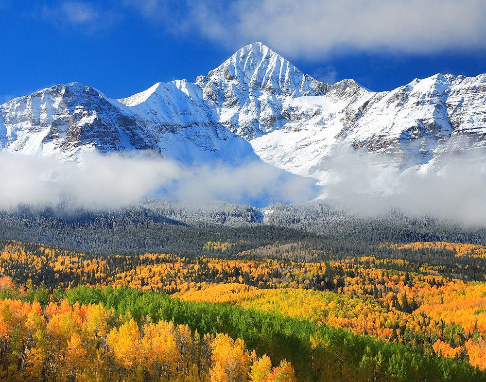 Wilson Peak Autumn A clearing storm dumps fresh snow on stately Wilson Peak, one of Colorado's 54 \