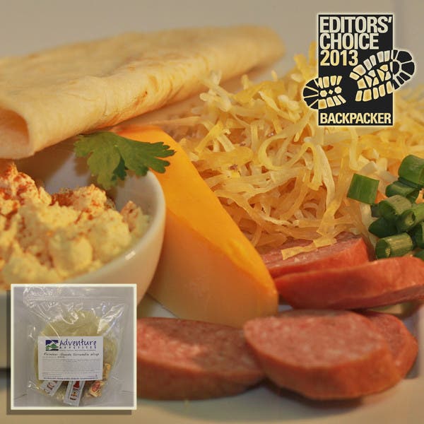 Adventure Appetites Reindeer Gouda Scramble Wrap Ideal for lazy mornings in camp, this hearty, complex egg wrap includes creamy, melty Gouda cheese, zesty reindeer sausage and fluffy eggs.