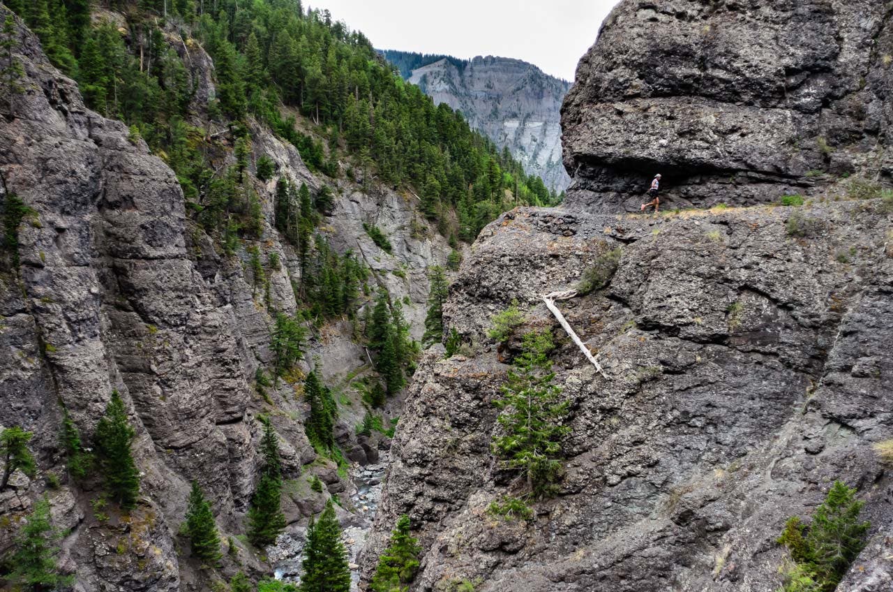 Don't get too close to the edge on the Bear Creek Trail near Ouray, CO. The old mining trail was blasted out of a cliffside and drops sharply to the…