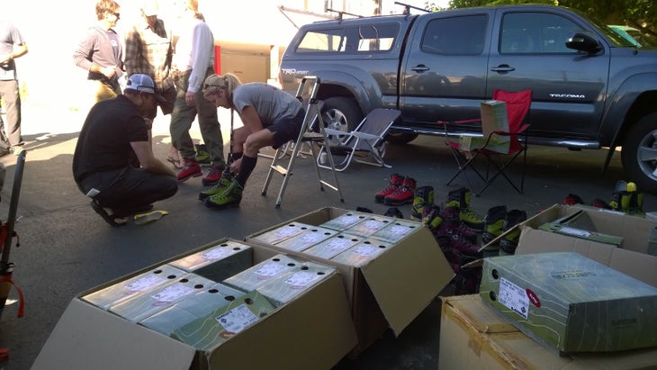 Climbing Mount Shasta Sorting gear with Shasta mountain guides before heading to trailhead.