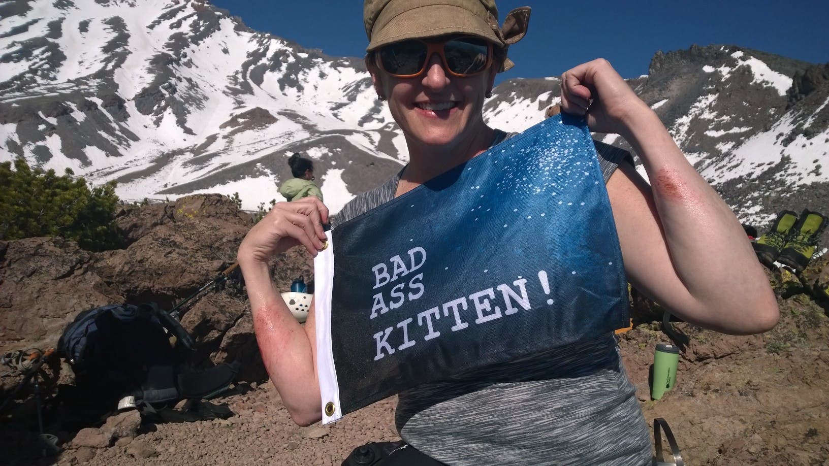 Climbing Mount Shasta Day 3 on Shasta, team 1 gets ready to head down the trail. Pringle loads her pack--big thanks to Jansport for equipping the climbers with packs.