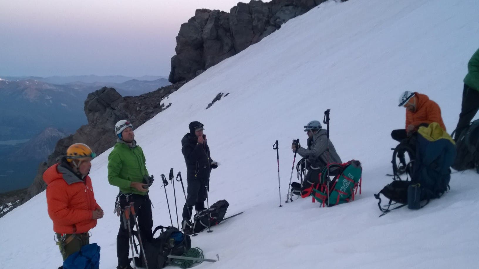 Climbing Mount Shasta After 6 hours of steady climbing, Doug takes a much deserved break on the saddle at the top of the West Face. Perfect weather again, no wind, clear…