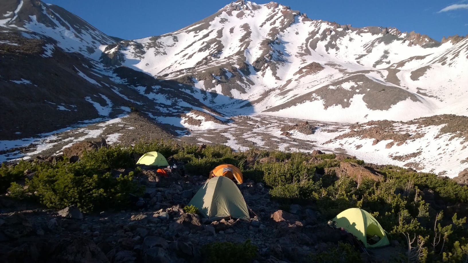 Climbing Mount Shasta 3 am, prepping for alpine start. Teams of 5 going up.