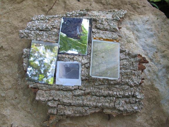 Behind every screen is some sort of shiny surface, which makes for a great signaling device.