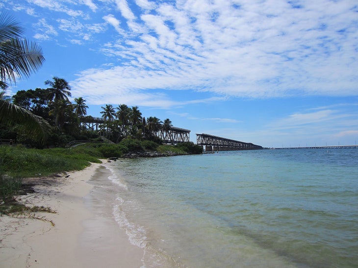 Bahia Honda State Park, Florida On Big Pine Key, white sand beaches are the norm. Visitors can enjoy birdwatching, fishing, canoeing, kayaking, scuba diving and snorkeling. Some…