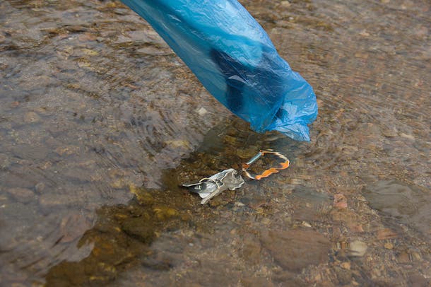 Reaching into cold water? Keep your gloves dry and your hands warm by using the bag as a protective glove.