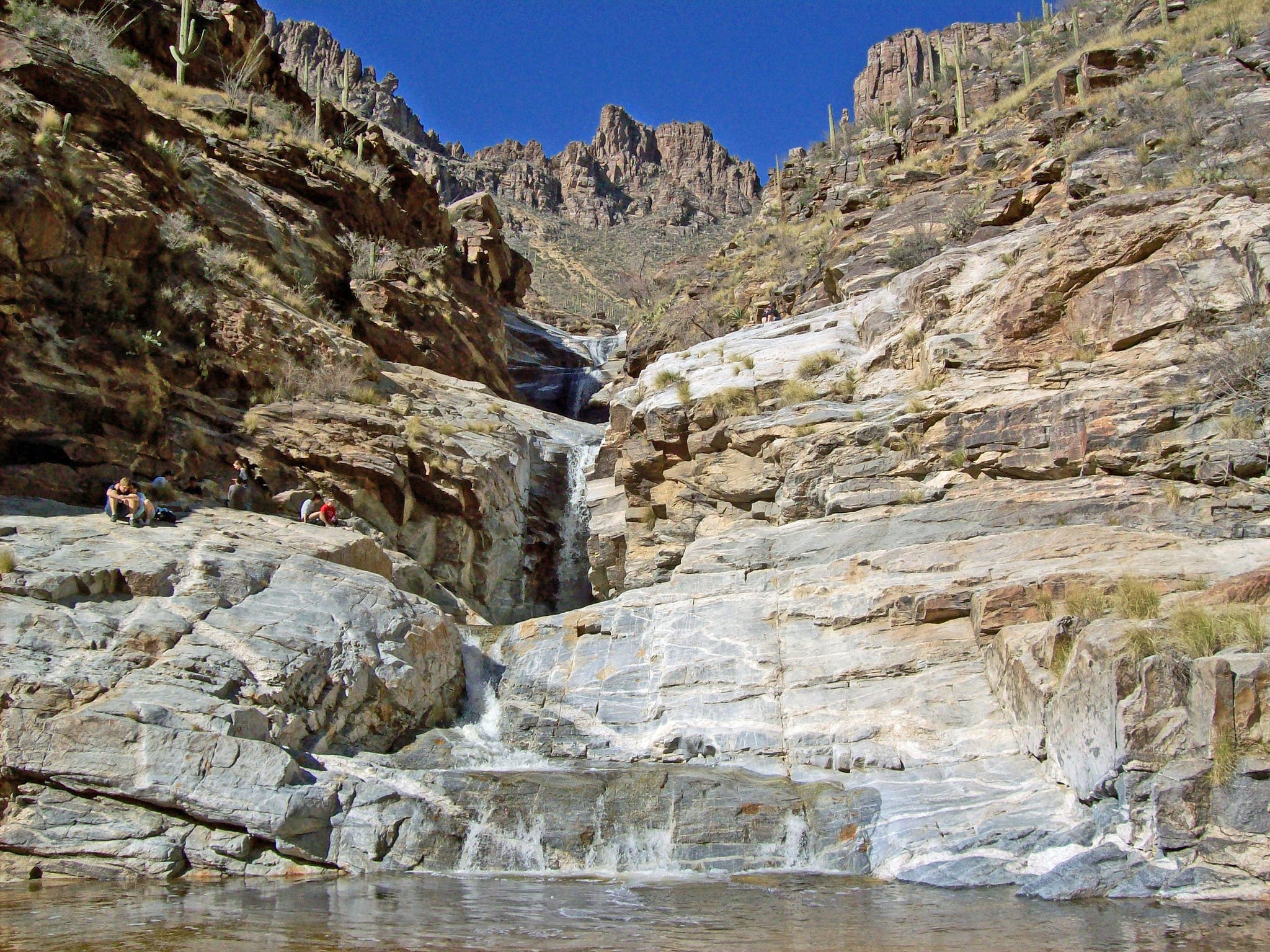 Seven Falls (Arizona) These waterfalls add some wet refreshment to the otherwise dry Arizona heat. Check out the Seven Falls trail in the Santa Catalina Mountains for 7.8…