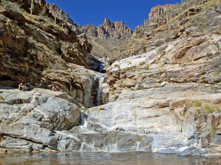 Seven Falls (Arizona) These waterfalls add some wet refreshment to the otherwise dry Arizona heat. Check out the Seven Falls trail in the Santa Catalina Mountains for 7.8…