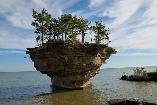 Turnip Rock, MI Storm waves are responsible for the bizarre shape of Turnip Rock, a formation jutting out of Lake Huron, just off of Michigan’s northeast shore.…