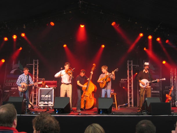 “Wagon Wheel Fiddles rule this Americana folk classic that evokes a restless spirit and greener grasses. We’ll sing along to “Rock me mama, like the wind and the…