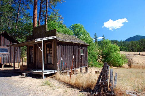 Buncom, OR Three buildings remain in Buncom from its heyday as a gold mining boomtown: a cookhouse, a post office, and a bunkhouse. Stop and take a look on your…