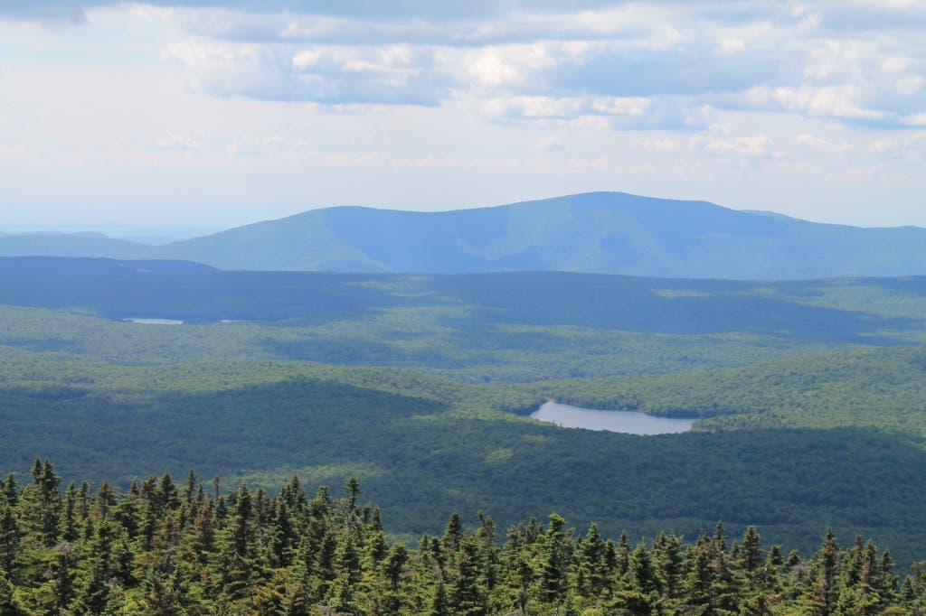 Pastoral vistas have attracted hikers to this fire tower in rural Vermont for over a century, but an air of mystery hangs thick over the mountain…