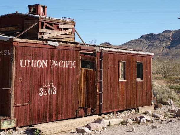 Rhyolite, NV Rhyolite is a must-see for visitors to Death Valley National Park. The well-preserved train station serves as the main attraction, but ruins of a…