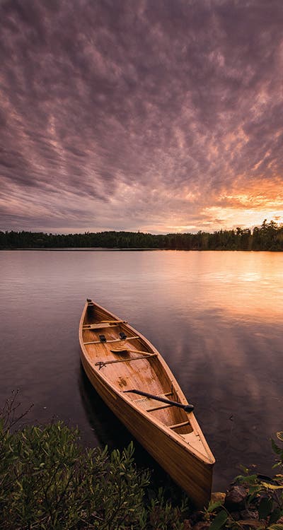 Canoe at Sunset Boundary Waters, Minnesota image by Bryan Hansel