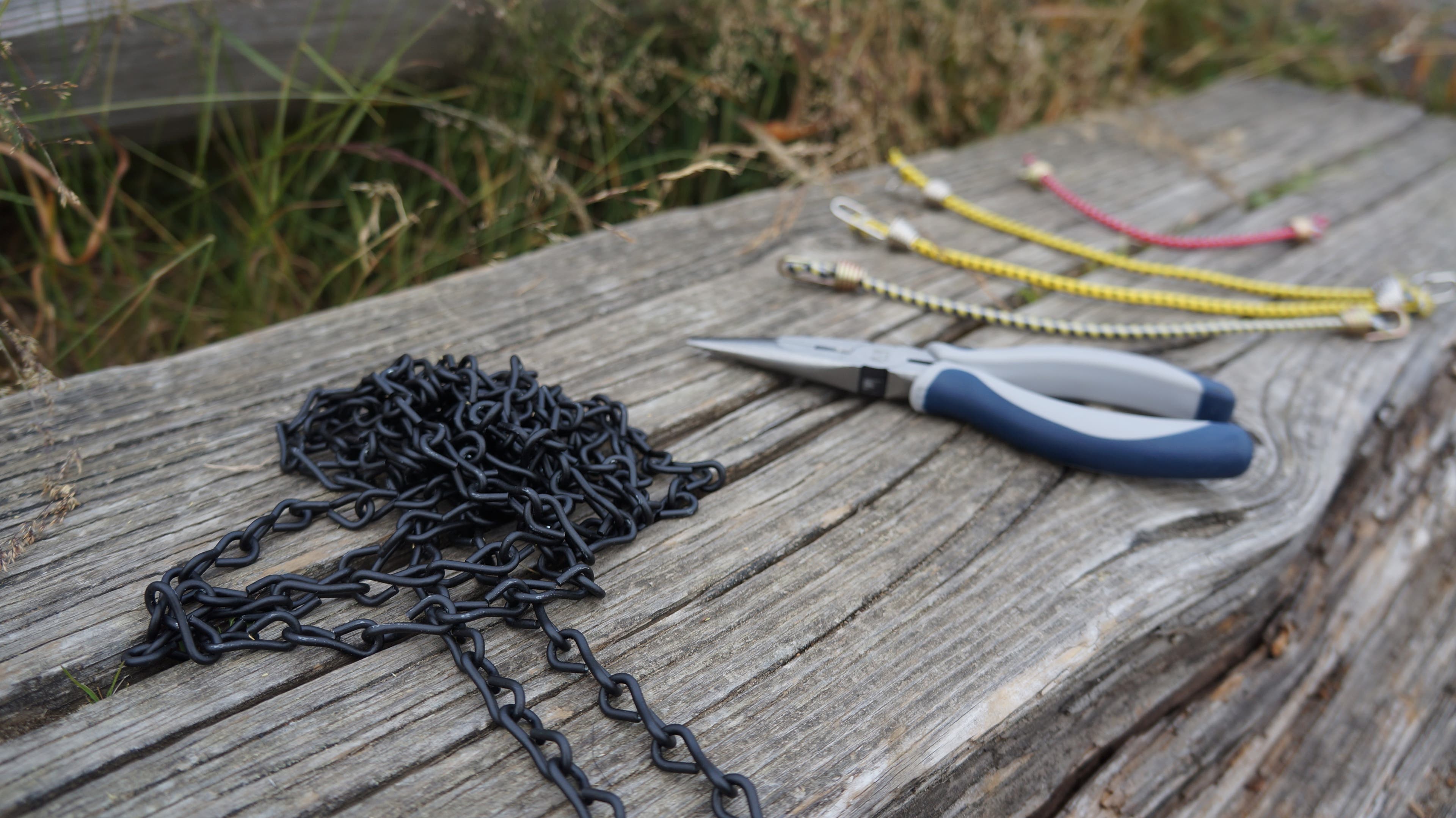 Make a loop from two bungees and place atop your shoe. Check for size: This will serve as the upper frame the traction chains will eventually attach…