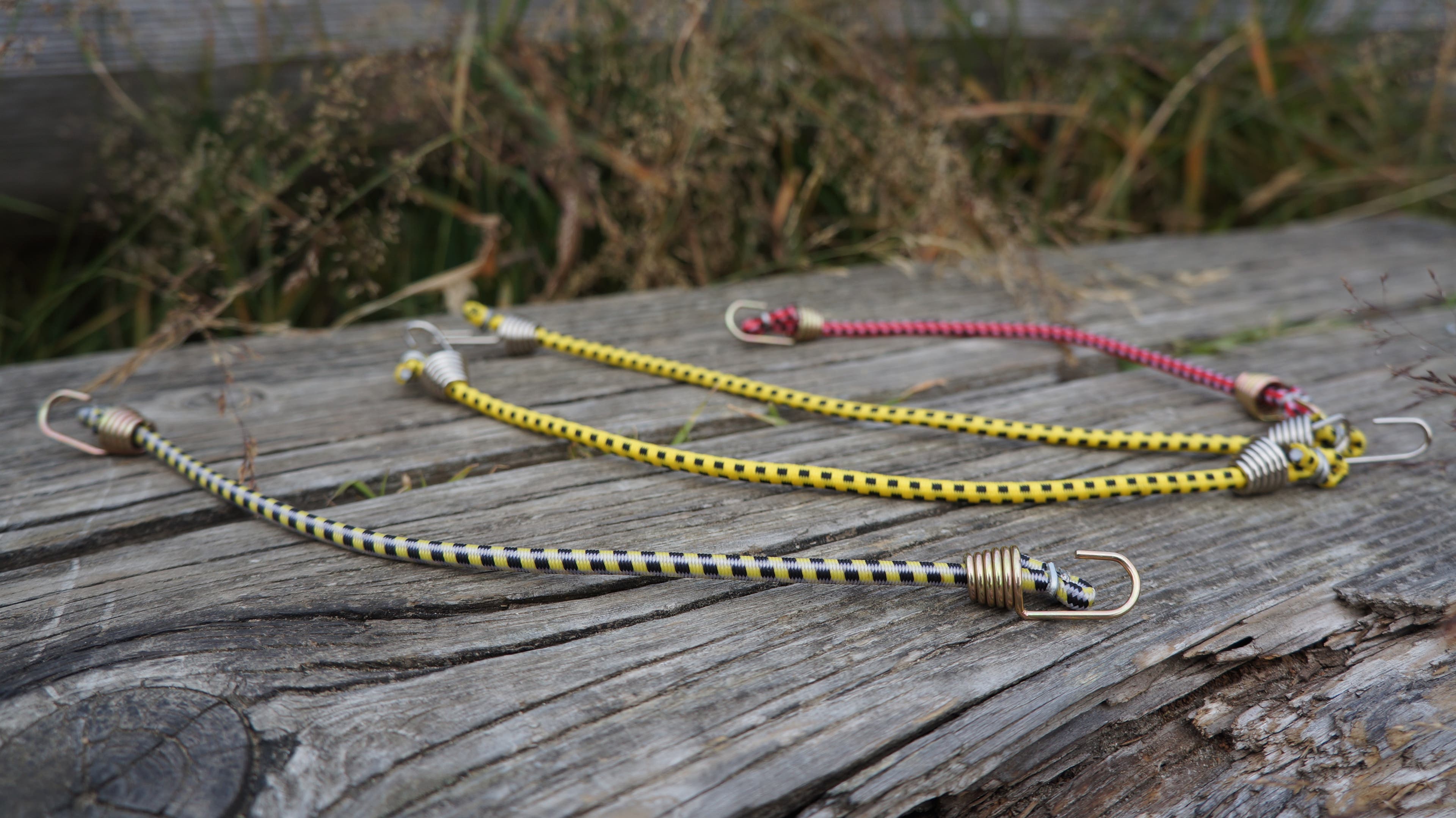 Get four bungee cords (two per shoe), about six inches in length. Experiment with lengths until you find the right one.
