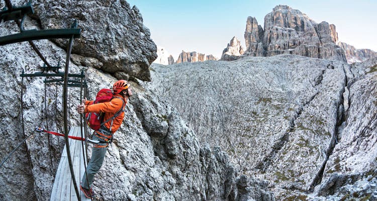 Bridge Crossing The author does his best Kate Winslet Interpretation on the airy bridge connecting Exner Tower to Sass Masores. (Patoticciphoto)