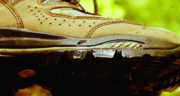 Outsole (footwear) The bottom part of the shoe, extending from the midsole to the ground.