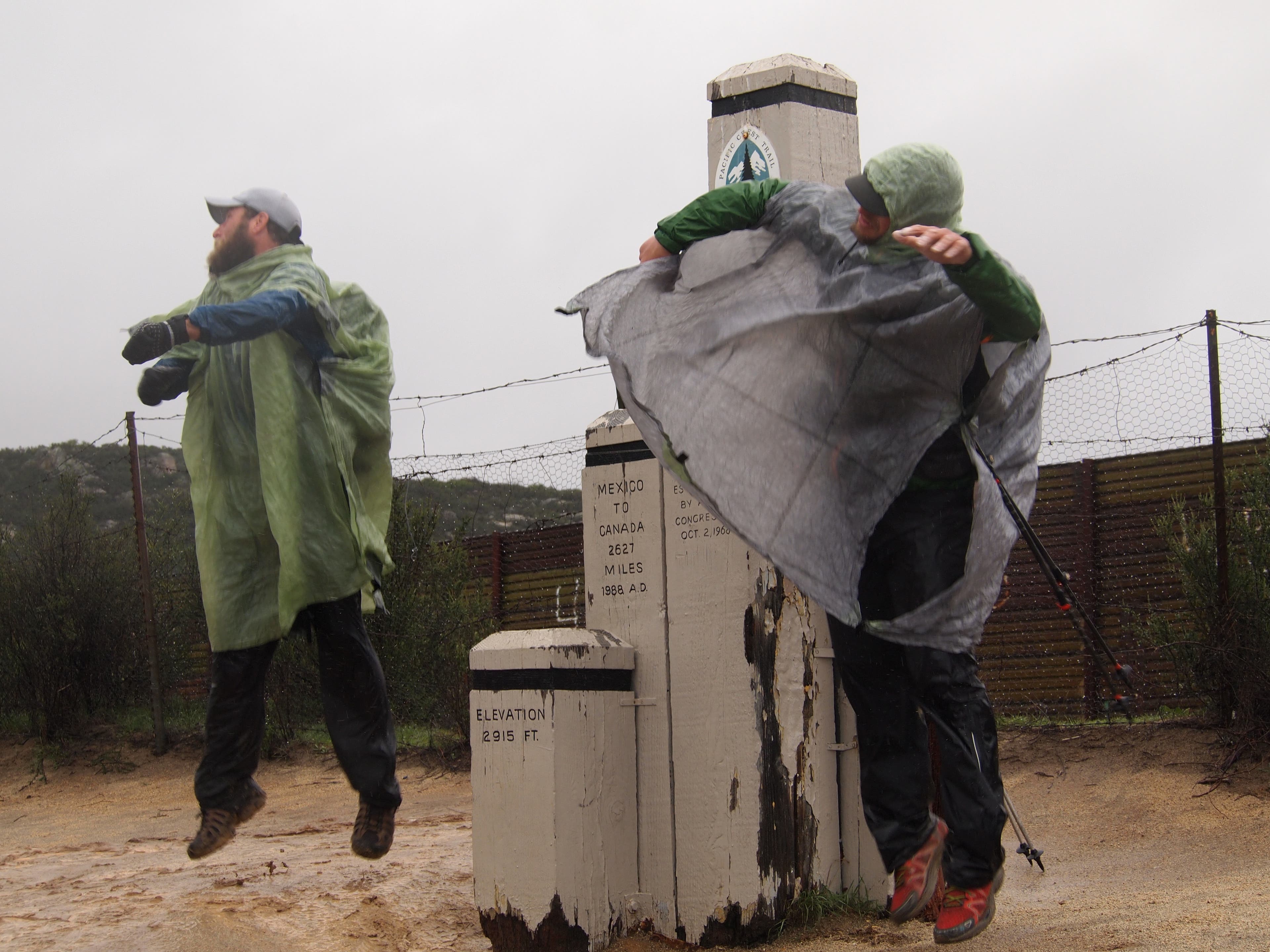 Shawn Forry (left) and Justin Lichter jump for joy at the southern terminus of the PCT (photo/Pea Hicks)