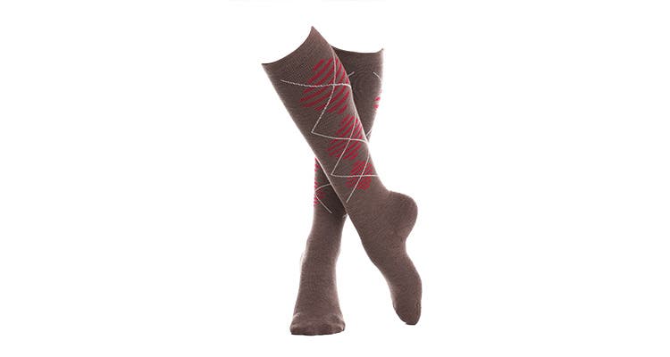 The lightly cushioned VIM & VIGR Women's Wool Compression Socks wick well and compress to speed recovery. Full review.