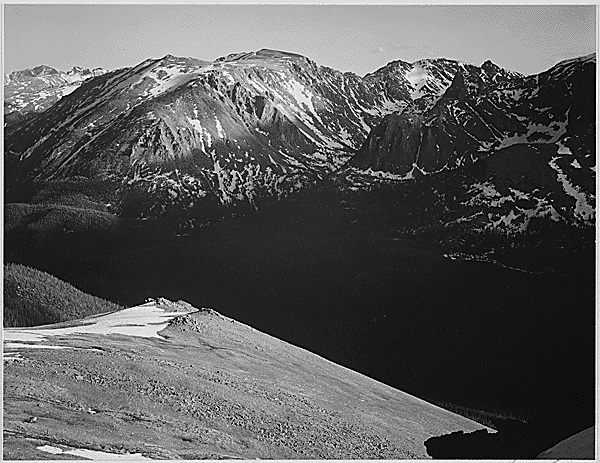 ”In Rocky Mountain National Park,” Colorado, panorama of barren mountains and shadowed valley, 1933-1942 photo: Ansel Adams / U.S. Department of the Interior