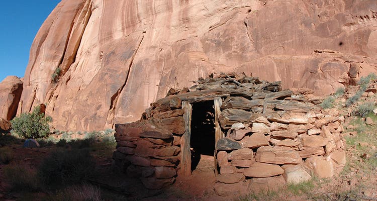 Photo by Greg Child Roberts chimneying into the farthest canyon, before it broadens out into what may have been the refuge.