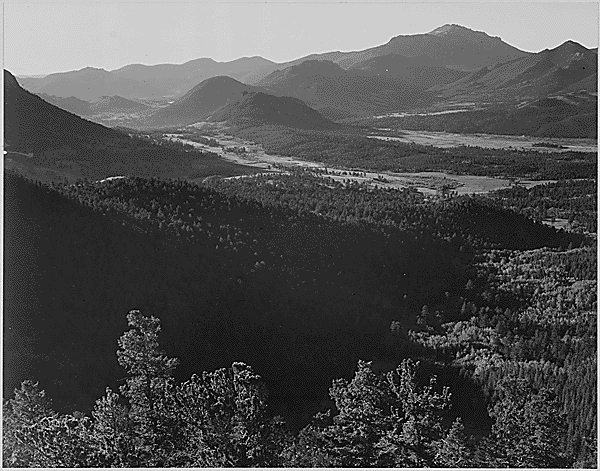 Valley surrounded by mountains “In Rocky Mountain National Park,” Colorado, 1933-1942 photo: Ansel Adams / U.S. Department of the Interior