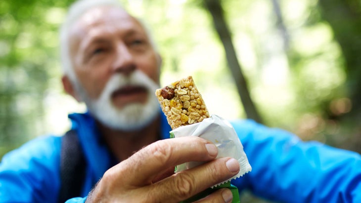 hiker with granola bar