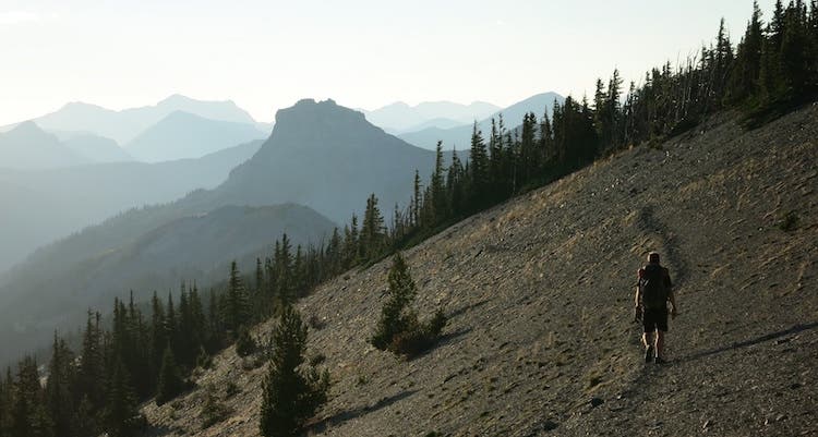 Great Divide Trail Hiking on the GDT just north of Waterton Lakes National Park where the trail lies directly on the Continental Divide. (photo by Jocelyn Wood)
