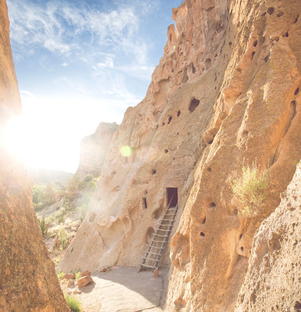 "Explore 11,000-year-old ruins and petroglyphs carved into the volcanic tuff in Bandelier. Photo by: D Scott Clark"