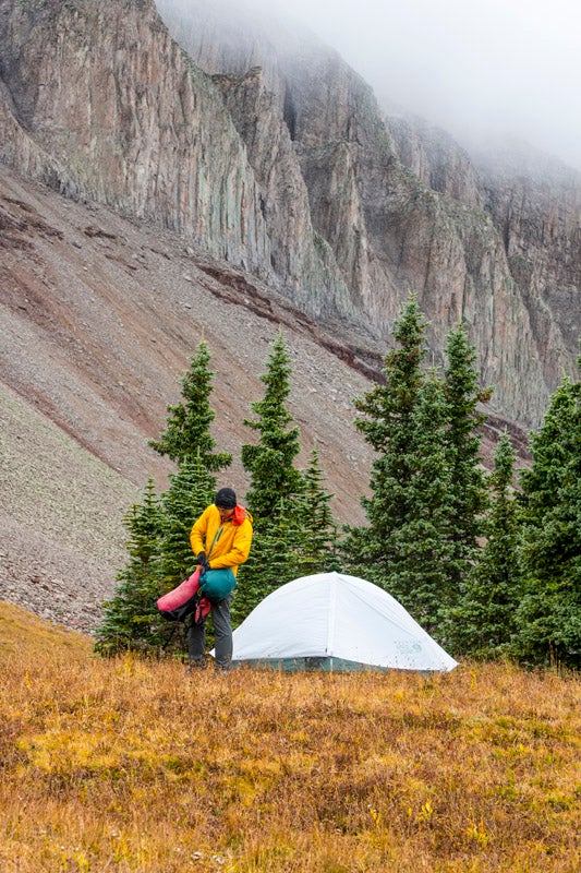 The Colorado Trail Fest BACKPACKER Editor-in-Chief Dennis Lewon and COBS instructor Dustin Moore hike through the fog on day 2.