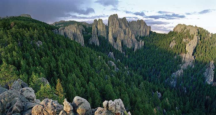 0317feat_firsts_blackhillssdtandem_gn See the Cathedral Spires from the .8-mile trail of the same name in Custer State Park. Photo by Marc Muench/Tandemstock.com