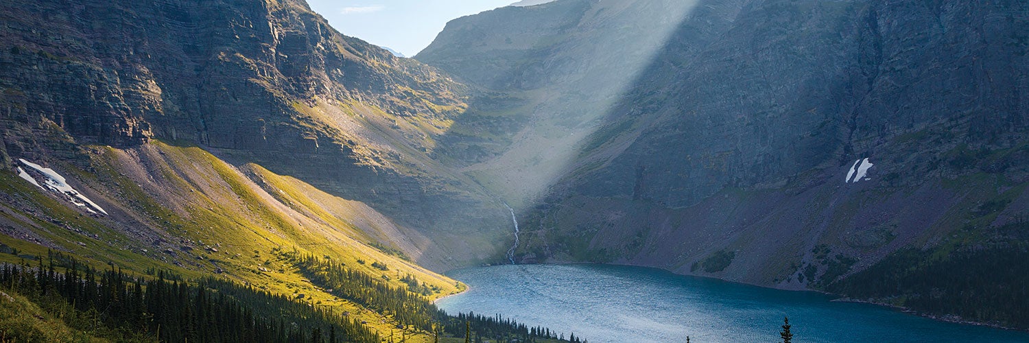 "Pass Lake Ellen Wilson on  day two when you drop down off Gunsight Pass (at the  head of the lake)."
