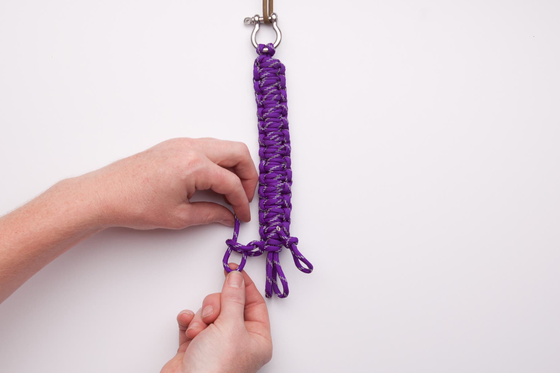 Make a Paracord Survival Bracelet 15 Repeat step 14 on the left side.