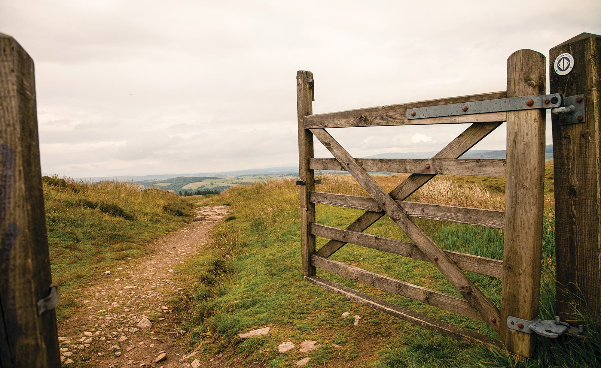 BP0118SCOT_JPeters_JohnMuirWay5460_gn-gf The path goes through a livestock gate in Darleith Muir (Muir means moor), on the route's western end in Scotland.