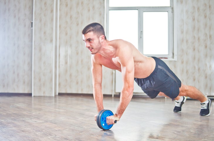 ab wheel rollout -upper body exercises for Backpackers