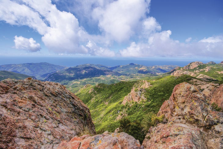 Views of green and rocky mountains from the Backbone Trail. 