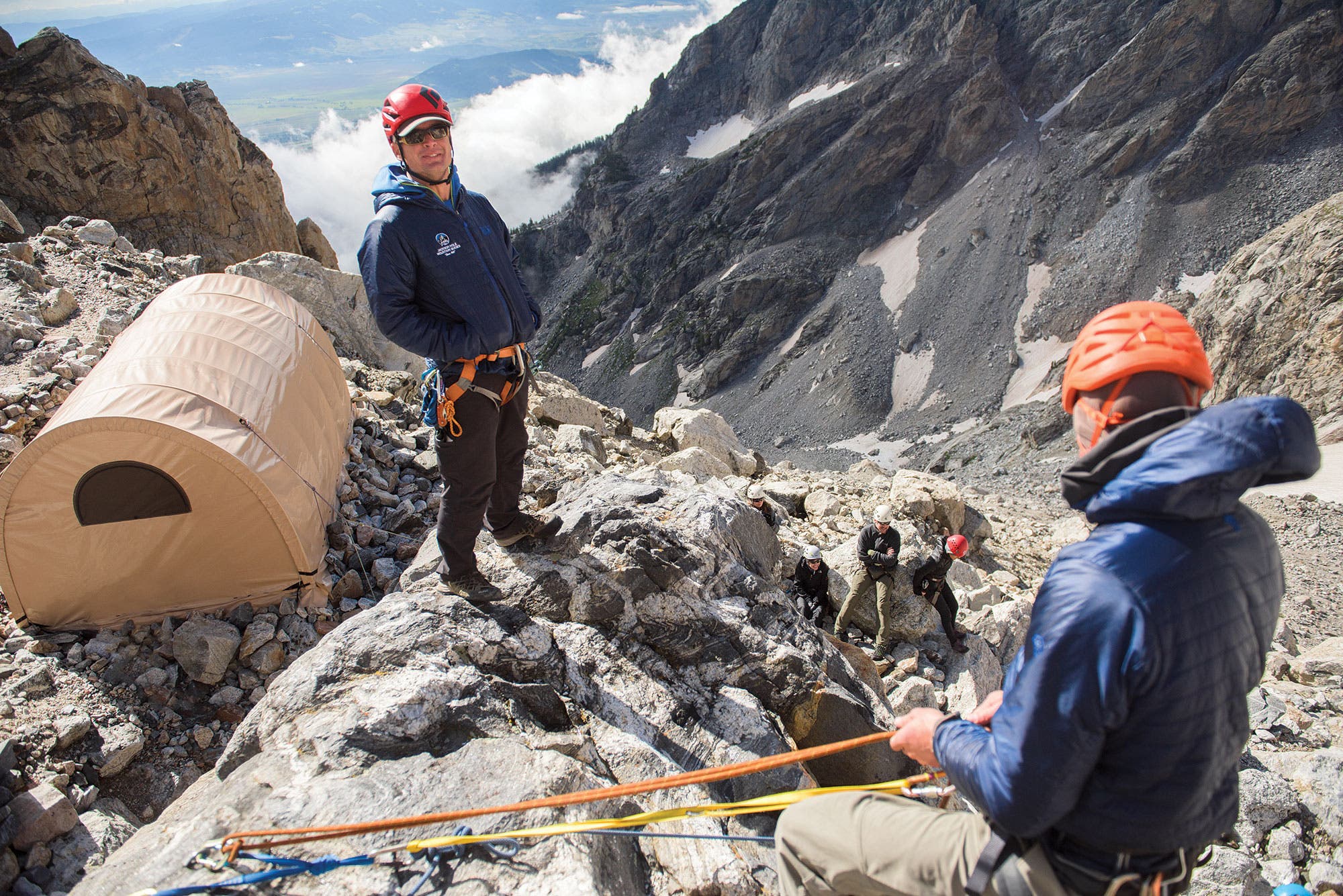 Mountains guides bring climbers up on belay to their camp at 11.200 feet during a summit push of Grand Teton. 