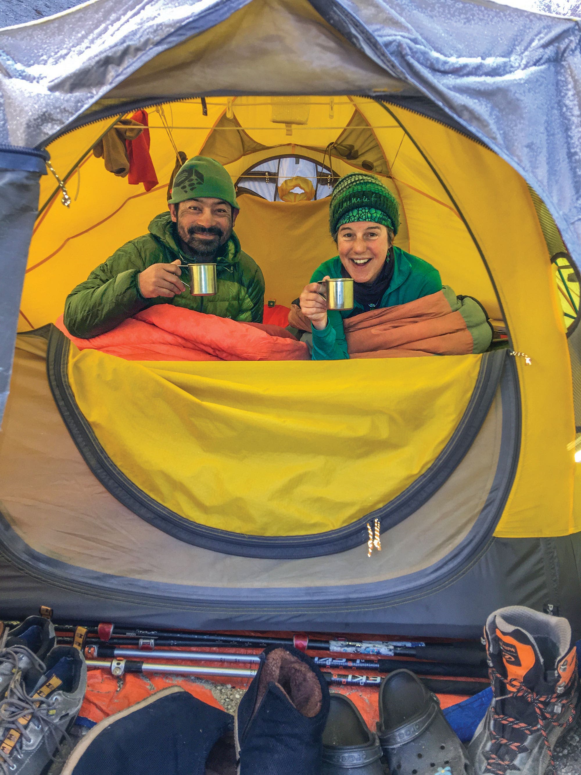 Morning Coffee, Great Himalaya Trail Head guide and author bundled in a tent enjoying morning coffee while hiking the Great Himalaya Trail together.