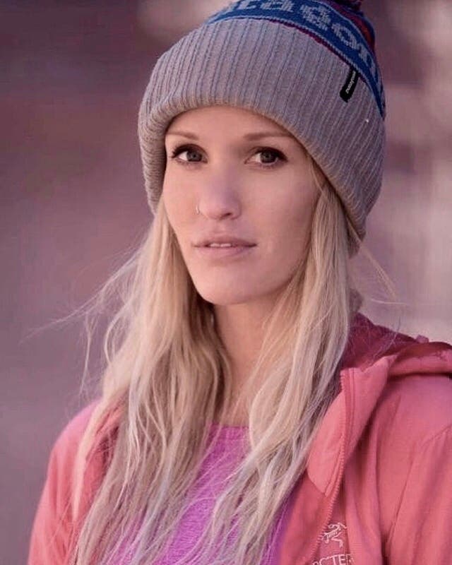 AlyseDietel Headshot of Alyse Dietel, a blonde white woman wearing a Patagonia beanie and pink zip up while looking directly into the camera.