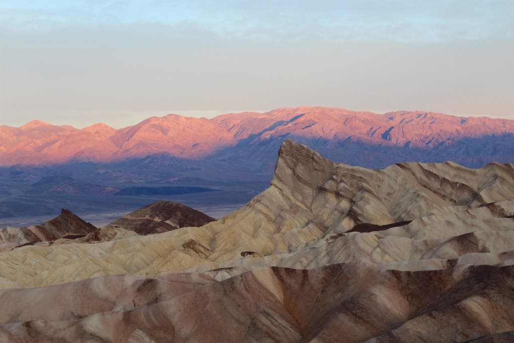 Zabriskie Point in Death Valley along the Golden Canyon/Gower Gulch Loop glows in the early morning sun on this magnificent desert hike. 