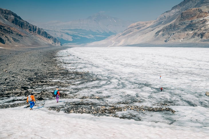 A group of mountaineers cross the expansive Athabasca Glacier in Canada