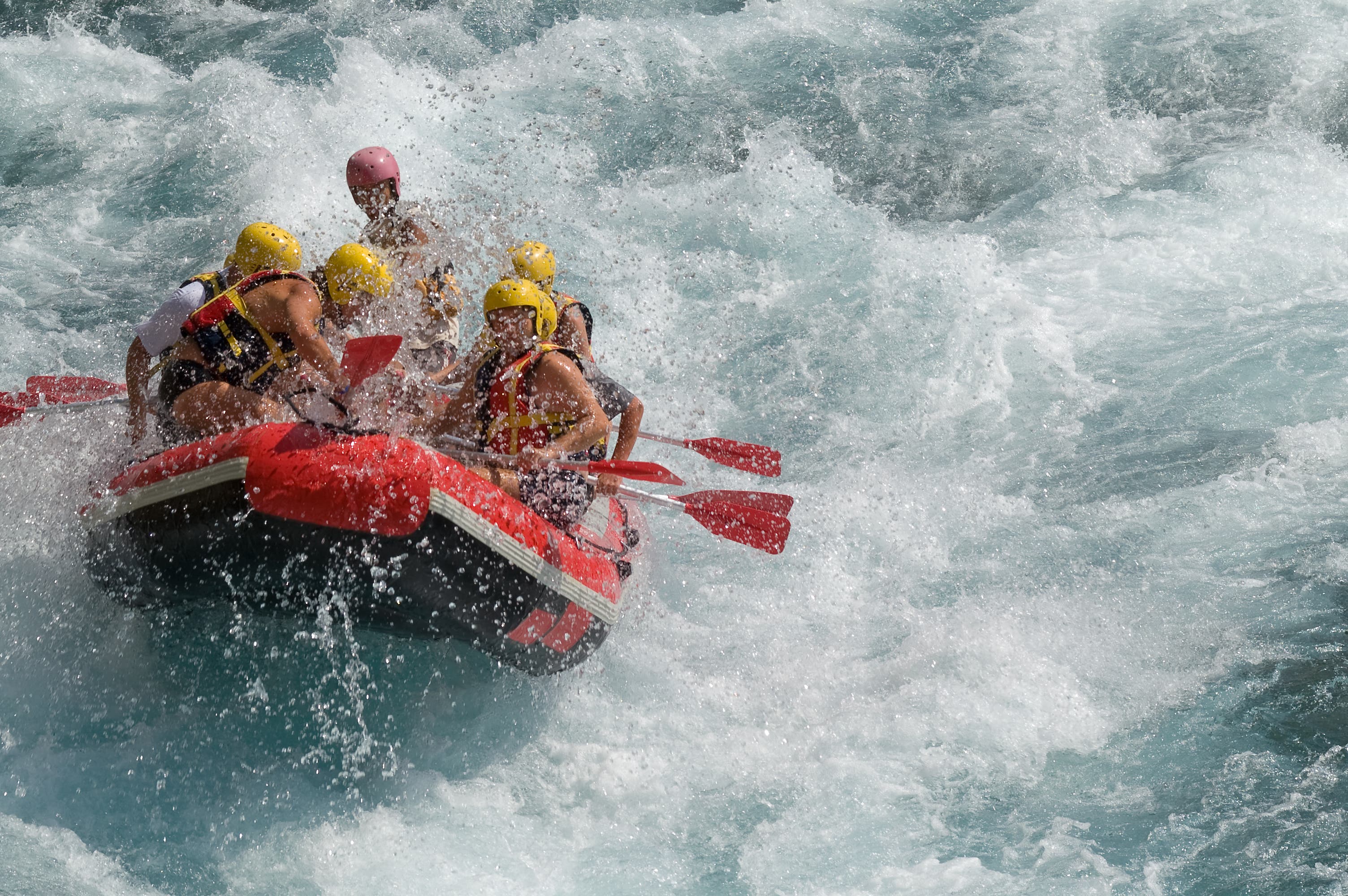 2_PCTC_whitewater rafting 5 people wearing yellow helmets, white water rafting on the Shoshone River.