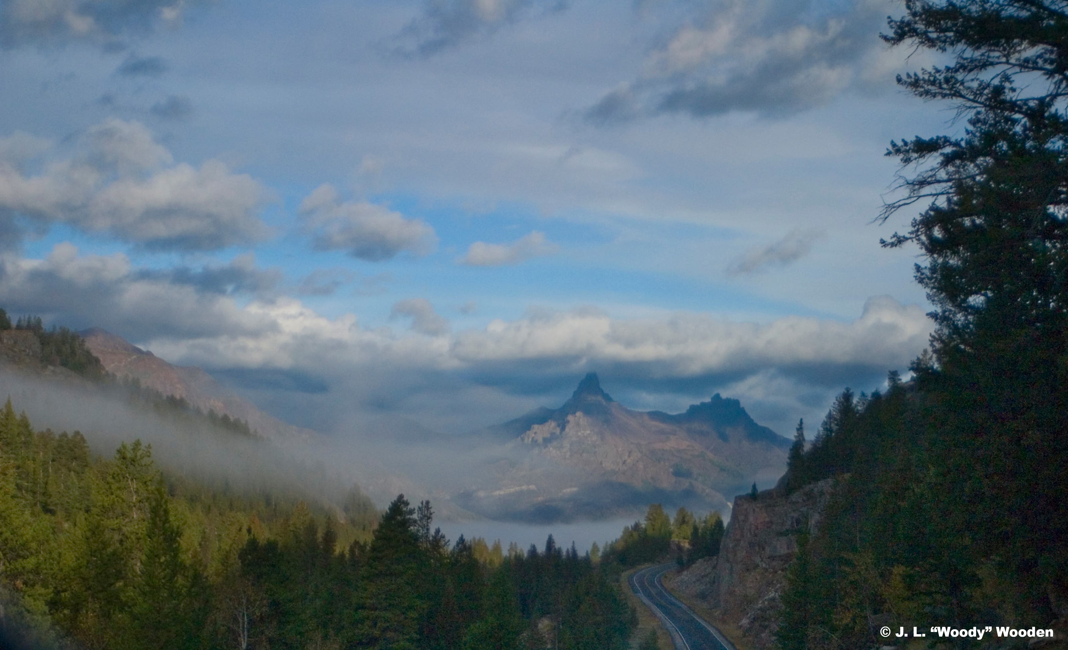 Scenic byway  road leading to entrance of Yellowstone.