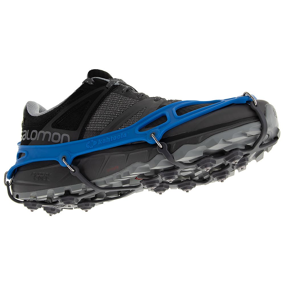 Kahtoola's EXOspikes in blue are wrapped around a black Salomon shoe.