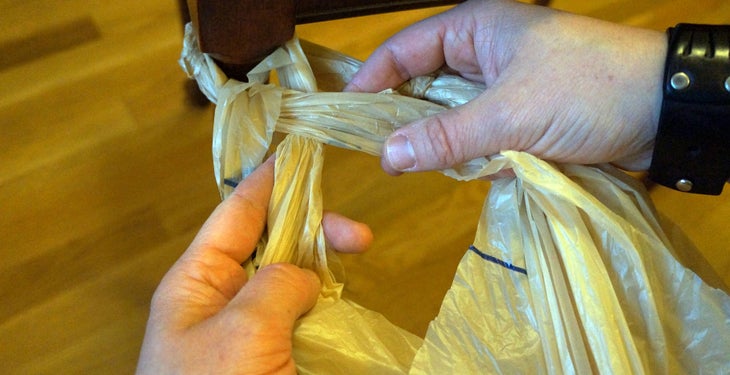 Plastic Bags: Step 13 Now with the two middle strands, fold left over right.