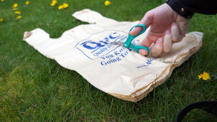 Plastic Bags: Step 2 Using scissors, bisect the bags vertically down the middle.